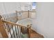 Elegant staircase with wrought iron railing and hardwood steps at 30410 E 161St Ave, Brighton, CO 80603