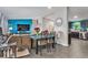 The dining area flows between the living room and kitchen, perfect for entertaining Gathering and friends at 1390 W 78Th Cir, Denver, CO 80221