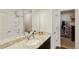 Bathroom featuring tub, shower, closet, and granite counter, perfect for relaxation and functionality at 7232 Shavano Ave, Frederick, CO 80504