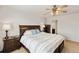 Cozy bedroom featuring a queen-sized bed, nightstands, and a warm, inviting ambiance at 7232 Shavano Ave, Frederick, CO 80504