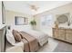 Cozy bedroom with neutral tones and a well-lit space at 5010 E 100Th Dr, Thornton, CO 80229