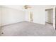 Spacious bedroom with a ceiling fan and adjoining bathroom at 5010 E 100Th Dr, Thornton, CO 80229