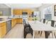 Spacious kitchen with stainless steel appliances and adjacent dining area at 5010 E 100Th Dr, Thornton, CO 80229