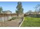 Backyard featuring a garden, shed, and grassy area, perfect for gardening and outdoor activities at 10457 Owens Cir, Broomfield, CO 80021