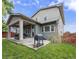 Spacious backyard patio with an outdoor grill, perfect for entertaining and enjoying outdoor meals at 8464 E 55Th Pl, Denver, CO 80238