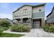 Charming two-story home with a balcony, porch, a covered parking area and well-maintained landscaping at 8464 E 55Th Pl, Denver, CO 80238