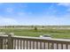 Enjoy stunning views from the balcony overlooking the landscape with a park and parking lot at 8464 E 55Th Pl, Denver, CO 80238
