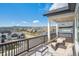 Outdoor deck area offering scenic views, perfect for relaxation and entertaining at 6586 S Lewis Ct, Littleton, CO 80127