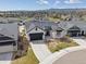 Stunning exterior with landscaped yard and mountain views in a desirable community at 6586 S Lewis Ct, Littleton, CO 80127