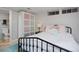 Basement bedroom featuring comfortable bedding and closet space, adjacent to the bathroom at 239 Ash St, Denver, CO 80220