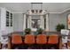 Chic dining room with modern chandelier, decorative walls, and long table perfect for entertaining at 239 Ash St, Denver, CO 80220