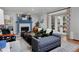 Bright living room with stylish decor and a cozy fireplace creates inviting space at 239 Ash St, Denver, CO 80220