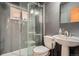 Bathroom featuring a glass-enclosed shower and modern fixtures at 925 Quitman St, Denver, CO 80204