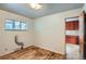Bedroom with hardwood flooring and a window providing natural light at 925 Quitman St, Denver, CO 80204