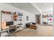 Spacious finished basement with a versatile layout, designed with a media space and workspace at 1833 E Jewell Ave, Denver, CO 80210