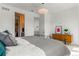 Bright bedroom with recessed lighting, neutral walls, and access to the closet at 1833 E Jewell Ave, Denver, CO 80210