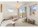 Bright Bedroom featuring ample natural light, modern furniture, and a calming atmosphere for a comfort at 1833 E Jewell Ave, Denver, CO 80210