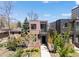 Beautiful two-story brick home with modern design, front porch, and well-manicured landscaping at 1833 E Jewell Ave, Denver, CO 80210