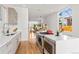 Modern kitchen with stainless appliances, large island, and natural light at 1833 E Jewell Ave, Denver, CO 80210