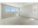 Bright bedroom with large windows providing natural light and scenic views at 5698 Farrier Pt, Castle Rock, CO 80104