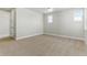 Cozy bedroom featuring neutral paint, carpeted floor, and ample space at 5698 Farrier Pt, Castle Rock, CO 80104