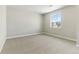 Cozy bedroom with large window allowing plenty of natural light at 5698 Farrier Pt, Castle Rock, CO 80104