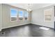 Bright dining room features large windows with neighborhood views, providing ample natural light at 5698 Farrier Pt, Castle Rock, CO 80104