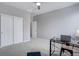 Bedroom features a desk, closet and plush carpeting throughout at 11568 Dewey St, Parker, CO 80138