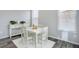 Bright dining room with white furnishings and natural light streaming through the windows at 11568 Dewey St, Parker, CO 80138