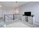Loft area with a media center, ceiling fan and a cozy carpet at 11568 Dewey St, Parker, CO 80138