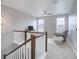 Loft space with plush carpeting, ceiling fan, and comfortable sitting area at 11568 Dewey St, Parker, CO 80138