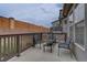 Cozy outdoor patio features seating for four, perfect for relaxing or entertaining guests in a private outdoor area at 11568 Dewey St, Parker, CO 80138