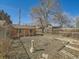 Backyard with a brick shed, fence, and garden at 2411 N High St, Denver, CO 80205