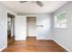 Spacious bedroom with hardwood floors and ceiling fan at 8240 Grandview Ave, Arvada, CO 80002