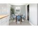 Charming dining area with seating for four and natural light at 8240 Grandview Ave, Arvada, CO 80002