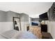 The bedroom boasts wood floors, a cozy fireplace, and a TV, perfect for relaxation at 3336 W 35Th Ave, Denver, CO 80211