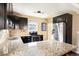 Updated kitchen with granite countertops, stainless steel appliances, and ample cabinet space at 3336 W 35Th Ave, Denver, CO 80211