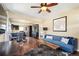 Spacious living room and dining area with hardwood floors, plenty of natural light and an open floor plan at 3336 W 35Th Ave, Denver, CO 80211