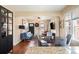 Inviting combined living space showcases an open floorplan with dining area and a cozy living room at 3336 W 35Th Ave, Denver, CO 80211