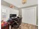 Home office featuring custom shutters, clean lines, and spacious closet at 638 S Dudley St, Lakewood, CO 80226