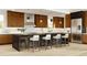 Modern kitchen featuring a marble island, stainless steel appliances, and contemporary lighting at 4444 W 28Th Ave, Denver, CO 80212