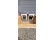 Basement egress windows with stone landscaping at 6521 Zinnia St, Arvada, CO 80004
