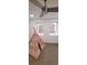 Finished basement bedroom with floral teepee, neutral carpet and window, creating a versatile and playful space at 6521 Zinnia St, Arvada, CO 80004