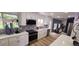 Beautiful kitchen with white cabinetry, stainless steel appliances, and stylish backsplash tiles at 6521 Zinnia St, Arvada, CO 80004