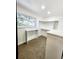 Walk-in closet featuring custom shelving and storage at 6521 Zinnia St, Arvada, CO 80004
