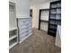 Walk-in closet featuring custom shelving and storage at 6521 Zinnia St, Arvada, CO 80004