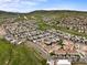 Aerial view of a well-planned community nestled in the mountains at 15547 W Vassar Ave, Lakewood, CO 80228