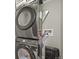 Close up of the efficient, stacked washer and dryer at 15547 W Vassar Ave, Lakewood, CO 80228
