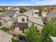 A beautiful exterior rear view, featuring a cozy patio and well-maintained landscaping in a desirable neighborhood at 15547 W Vassar Ave, Lakewood, CO 80228