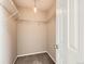 This walk-in closet has carpet and ample storage with wire shelving and lighting at 5888 Biscay St # D, Denver, CO 80249